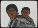 Image of Eskimo [Inuk] Woman with Baby in Hood
